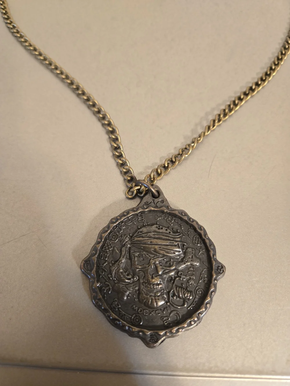 Disney Parks Pirates of the Caribbean Medallion The Pirates League Skull Pendant
